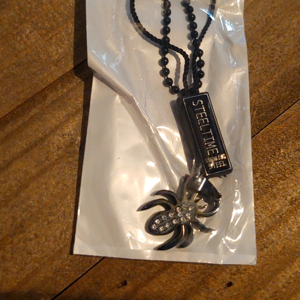 Black stainless steel spider necklace. 30" NWT.